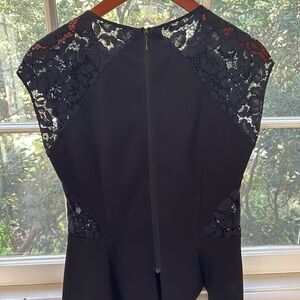 Peplum top with lace detail.